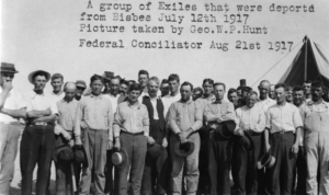 1494041max REVOLUTIONARY News TODAY - Revolutionary News Today! Group of Men in Shirts and Hats Posing Outdoors, with a Tent to the Right, During the 1917 Bisbee Deportation Event.