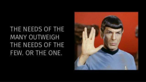 - Revolutionary News Today! Meme with a Vulcan Salute: Mr. Spock on the Right, Hand Raised; Left Panel Shows the Words “the Needs of the Many Outweigh the Needs of the Few. or the One.”